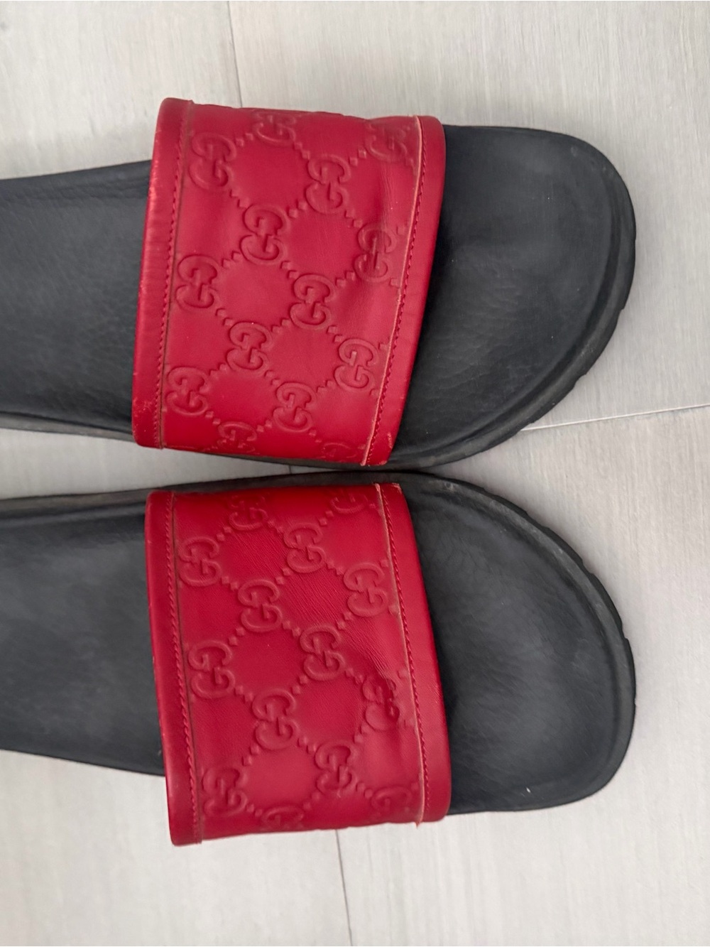 Authentic Gucci GG Supreme embossed rubber slides in red